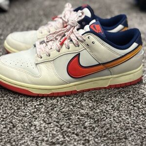 Mens 8.5 Nike low dunks with Red and Orange Accents